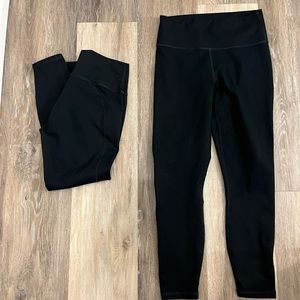 Two pairs black powerhold fabletics leggings